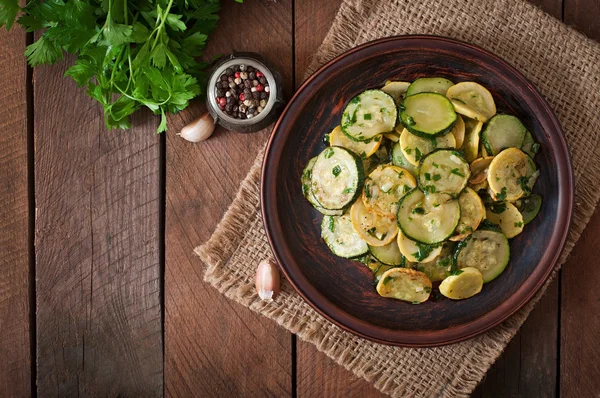 Zucchini with garlic and herbs — Stock Photo, Image