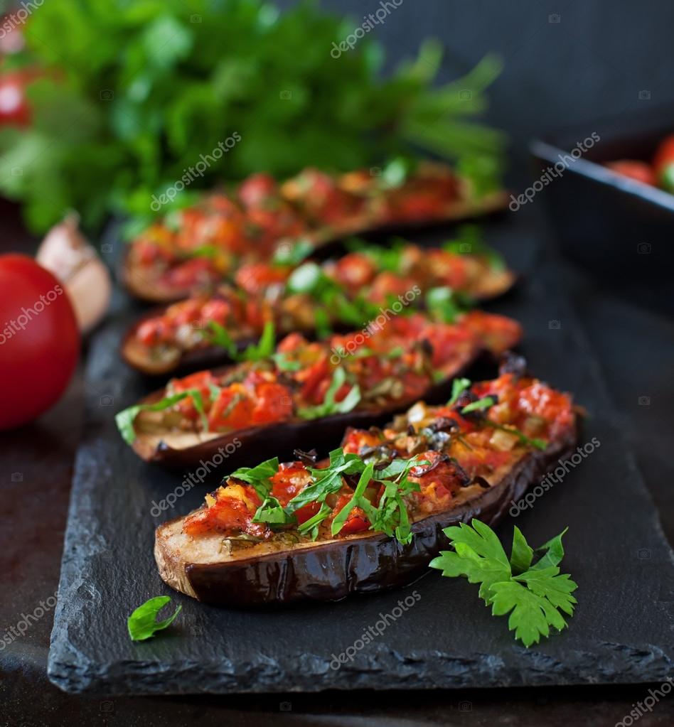 Baked eggplant with tomatoes — Stock Photo © timolina 77758394