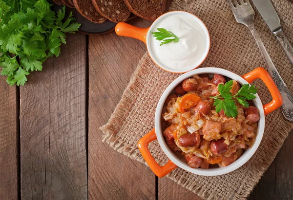 Polish bigos with smoked sausage and bacon — Stock Image Polish bigos with smoked sausage and bacon Royalty Free Stock Photos