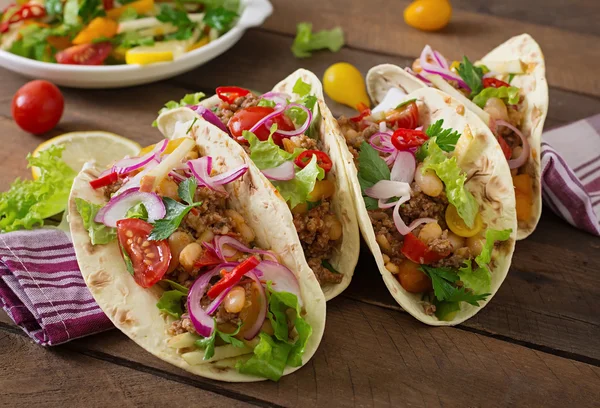 Mexican tacos with meat, beans and salsa — Stock Photo, Image