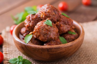 Meatballs in  tomato sauce clipart