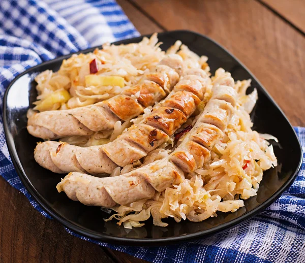 Munich sausages with fried cabbage — Stock Photo, Image