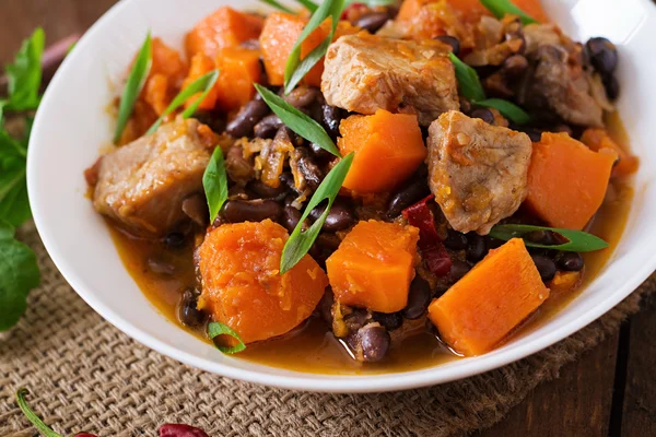 Baked spicy pumpkin with meat and beans — Stock Photo, Image