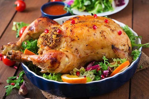 Baked chicken stuffed with rice for Christmas dinner — Stock Photo, Image
