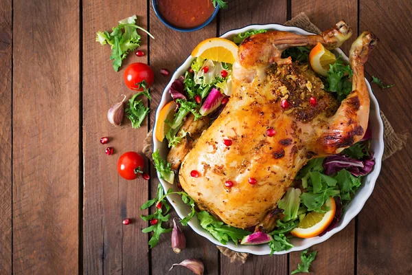 Baked chicken stuffed with rice for Christmas dinner — Stock Photo, Image