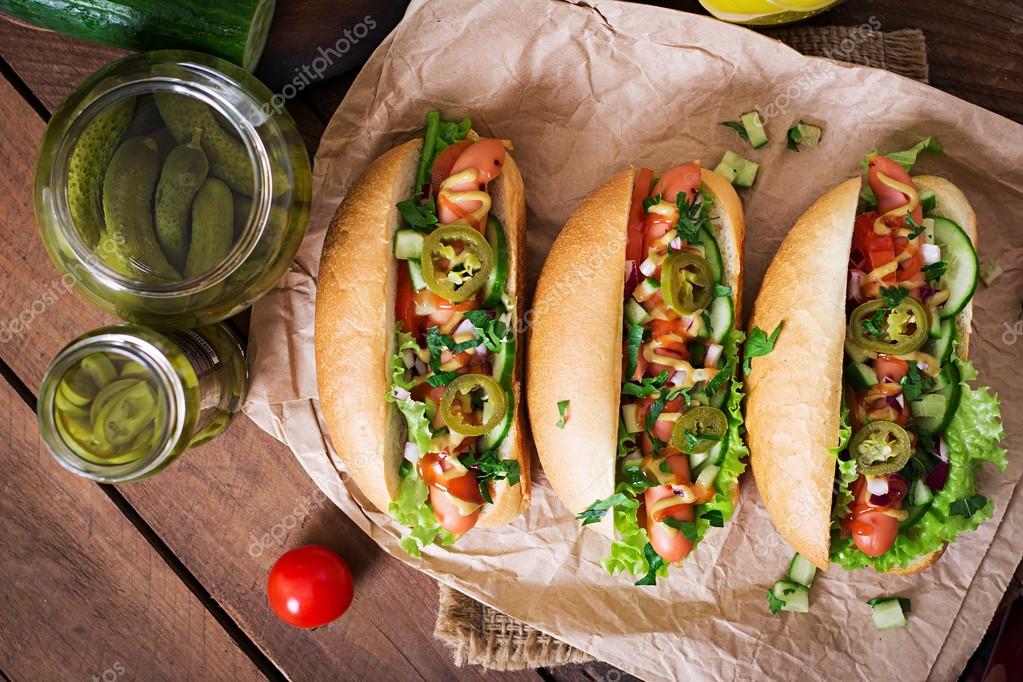 Hot dogs with vegetables Stock Photo by ©timolina 90605058