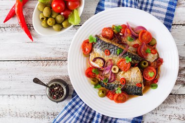 Grilled mackerel with vegetables in Mediterranean style