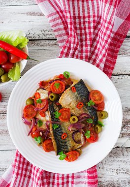 Grilled mackerel with vegetables in Mediterranean style