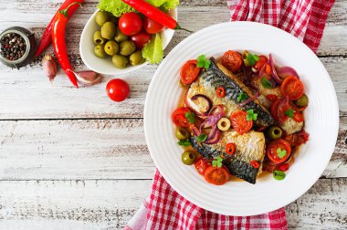 Grilled mackerel with vegetables in Mediterranean style