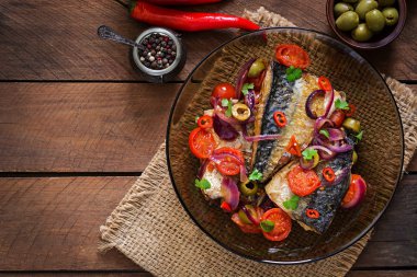 Grilled mackerel with vegetables in Mediterranean style