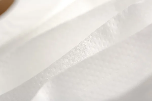 Белая туалетная бумага крупным планом — стоковое фото