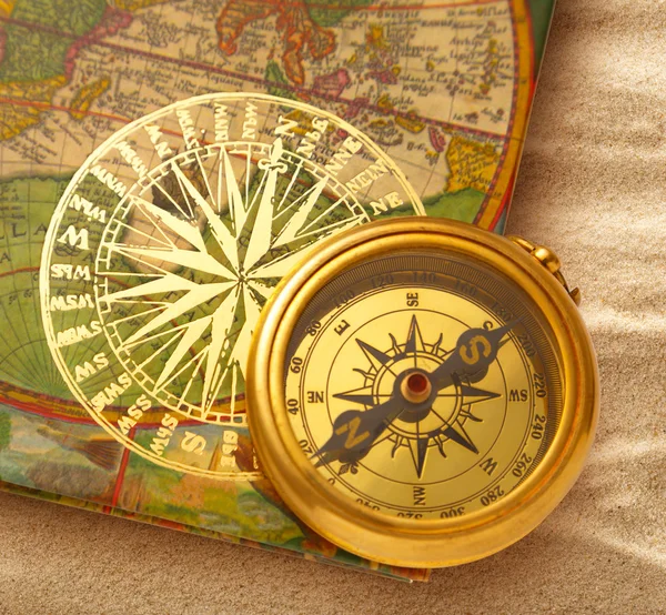 Book with retro golden compass — Stock Photo, Image