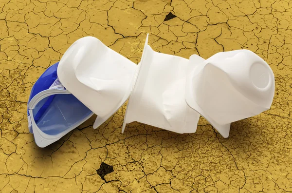 Empty crushed plastic yogurt pots — Stock Photo, Image