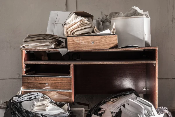 Messy workplace with stack — Stock Photo, Image