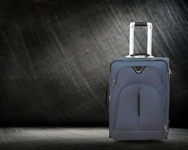 Large gray suitcase on wheels — Stock Photo, Image