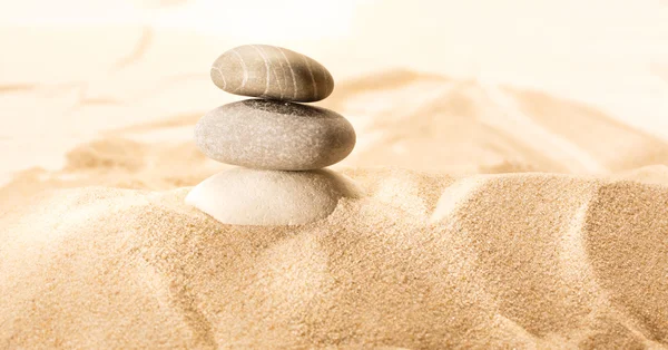 Пісок і морські камені — стокове фото