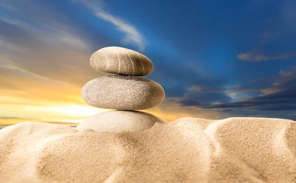 Zand en zee stenen — Stockfoto