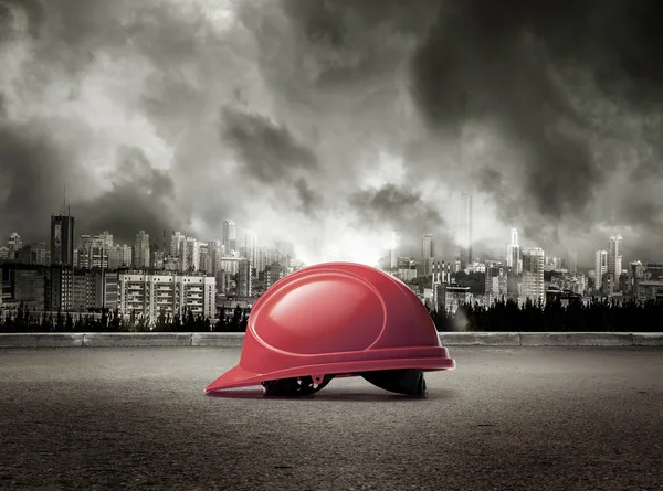 Helmet on stormy sky background — Stock Photo, Image