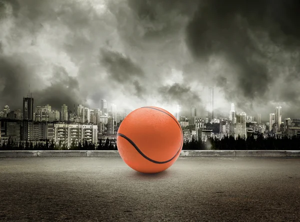 Ball on stormy sky background — Stock Photo, Image