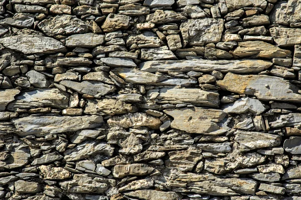 Antico muro di pietra — Foto Stock