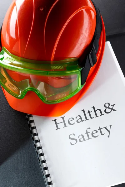 Goggles and red helmet — Stock Photo, Image