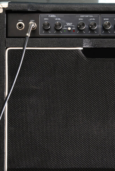 Black guitar amplifier in closeup