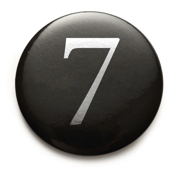 Biały numer 7 na czarny znaczek — Zdjęcie stockowe