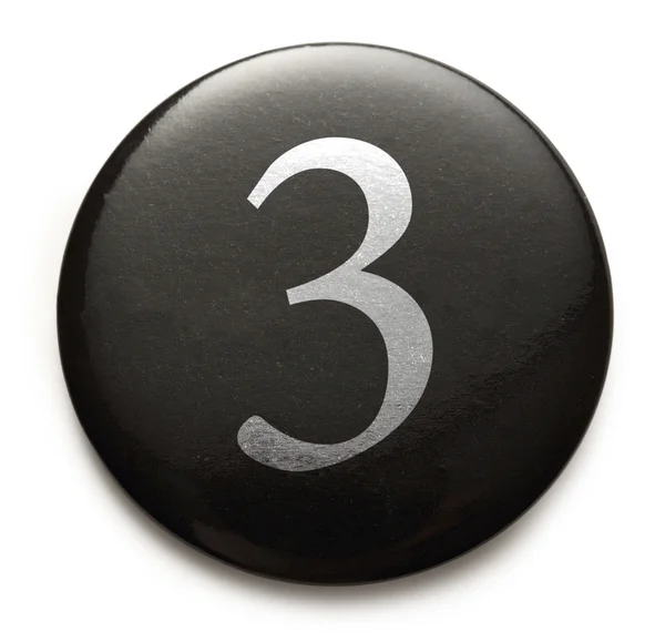 White number 3 on black badge — Stock Photo, Image