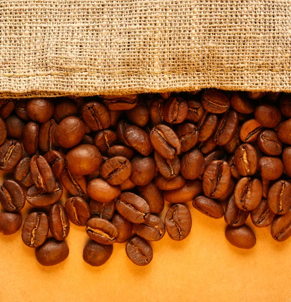 Coffee beans with sack — Stock Photo, Image