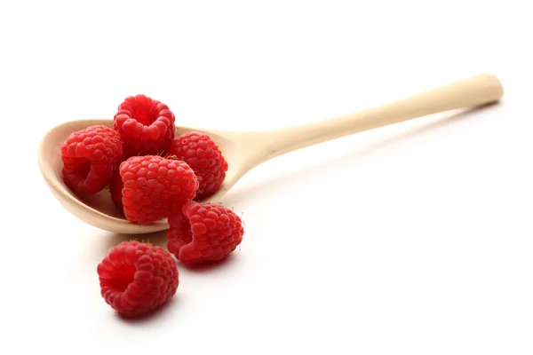 Raspberry in wooden spoon — Stock Photo, Image