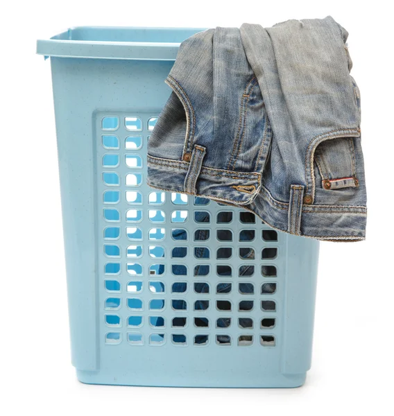 Basket with dirty jeans — Stock Photo, Image