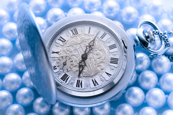 Watch on blue pearl — Stock Photo, Image