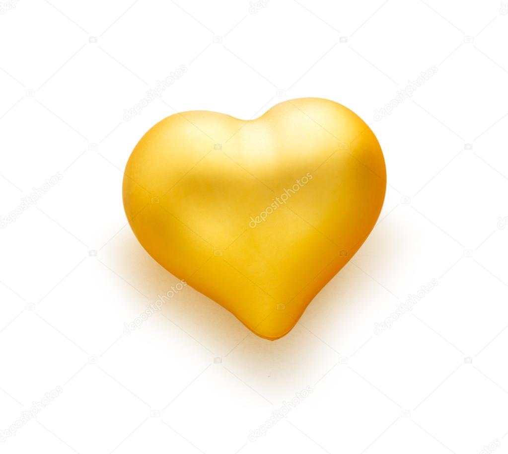 Golden heart on white background 