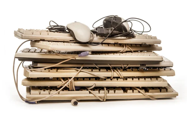 Old computer hardware and keyboards — Stock Photo, Image