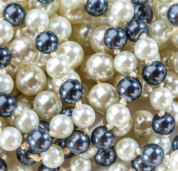 String of black and white pearls — Stock Photo, Image