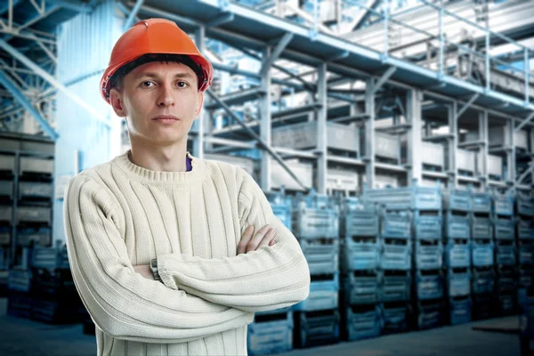 Workman in big storage room — Stock Photo, Image