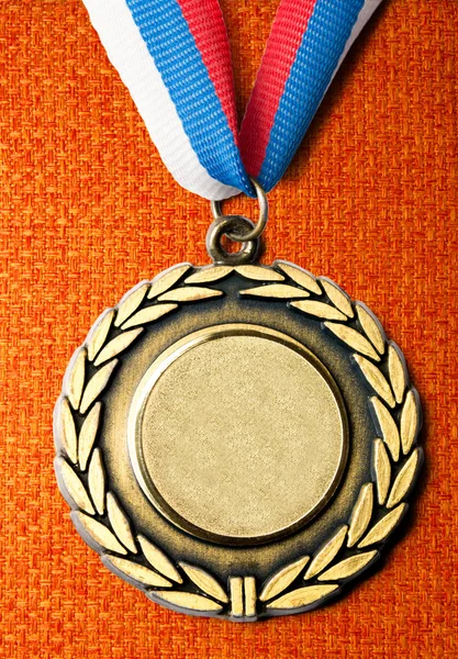 Medalha de metal com fita tricolor — Fotografia de Stock