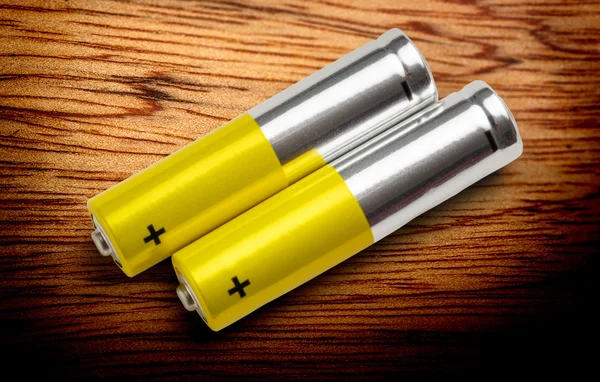 Två batterier med plustecken — Stockfoto