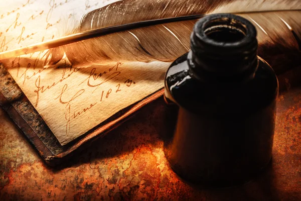 Old book with feather pen — Stock Photo, Image