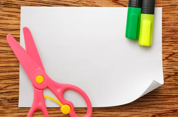 Safe scissors and markers on  paper — Stock Photo, Image