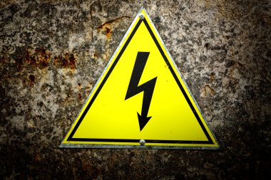 Old yellow high voltage sign clipart