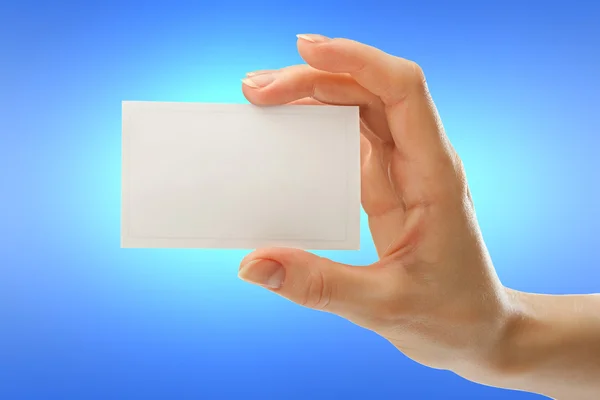 Blank card in female hand — Stock Photo, Image