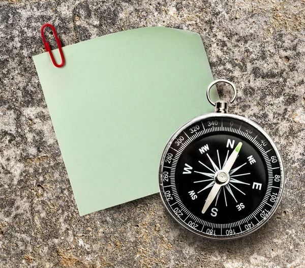 Blank green sticker and compass — Stock Photo, Image