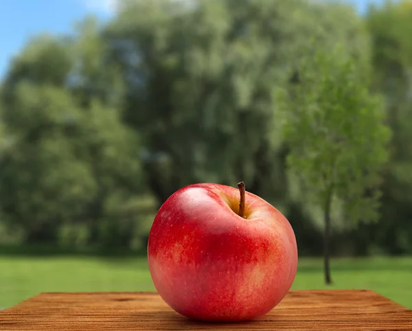 Red apple on outdoor — Stock Photo, Image