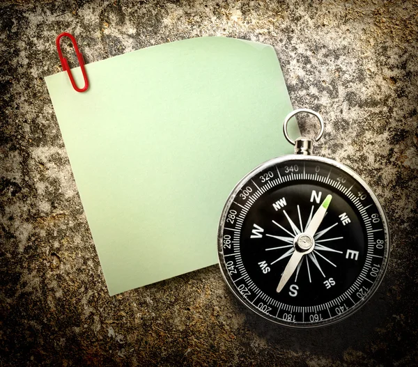 Blank green sticker and compass — Stock Photo, Image