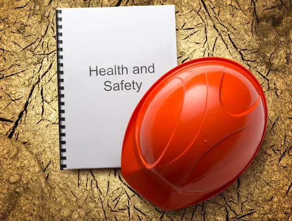 Gesundheits- und Sicherheitsregister mit Helm — Stockfoto