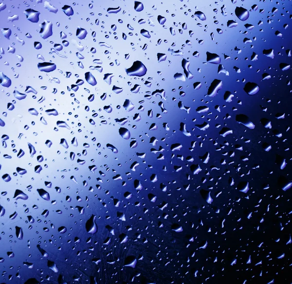 Cold rain drops on window — Stock Photo, Image