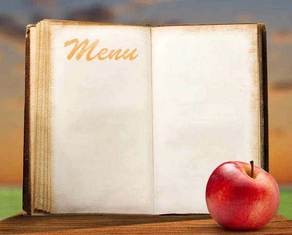 Open blank menu book with apple — Stock Photo, Image