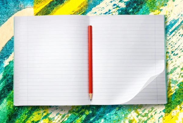Open notebook with red pencil — Stock Photo, Image