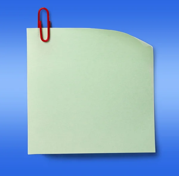 Blank green sticker and red clip — Stock Photo, Image